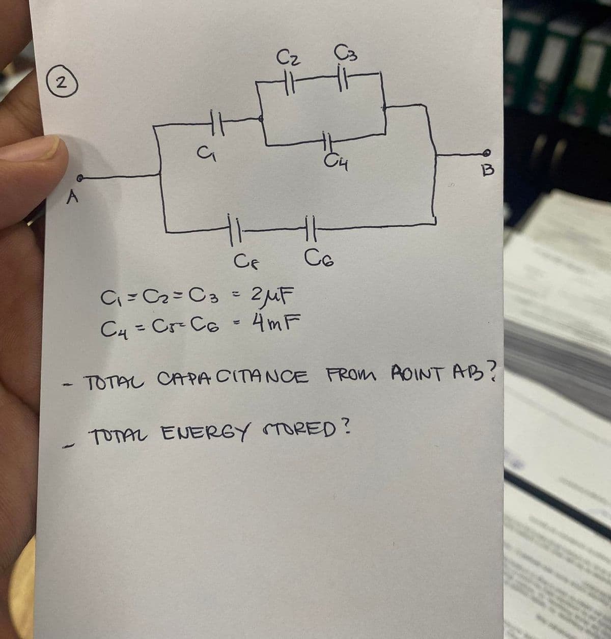 2
A
C₁
Cz
C3
C4
B
11-1
Cf
C6
C₁=C₂ = C3 = 2μF
4mF
C4 = Cr²C6
TOTAL CAPACITANCE FROM AOINT AB?
TOTAL ENERGY STORED?